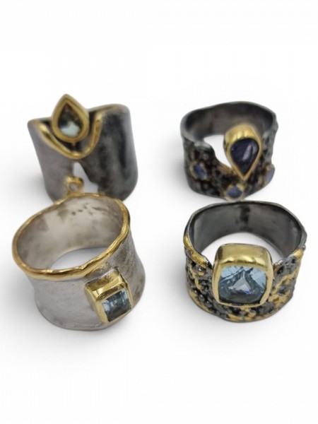 Four pieces,  handmade silver rings.